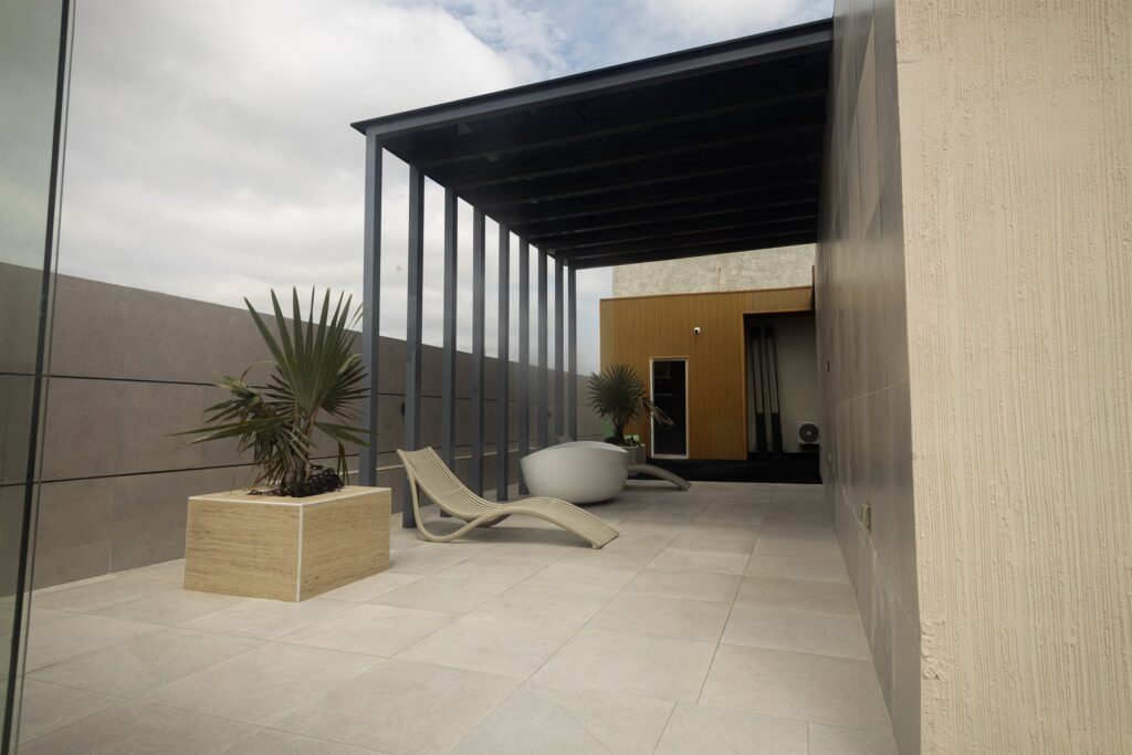 Brum Height 6: Rooftop leisure terrace with seating and planted borders
